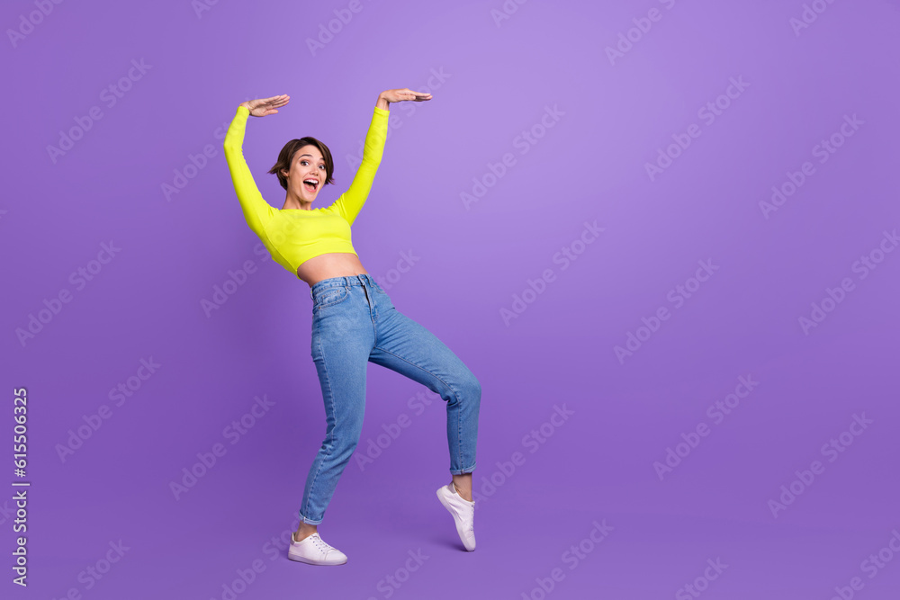 Full body photo of positive nice lady chilling dancing rejoice empty space advert isolated on violet color background