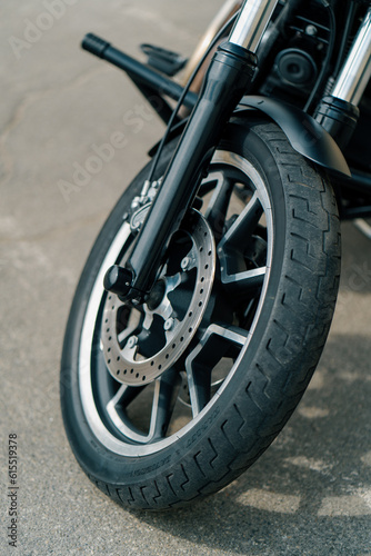 Close up wheel of a powerful off-road motorcycle concept of motorsport or active lifestyle side view