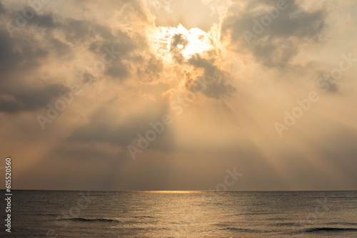 Closeup sea with inspire tropical beach seascape. Orange and golden sunrise and cloud sky tranquil relaxing sunlight summer emotion