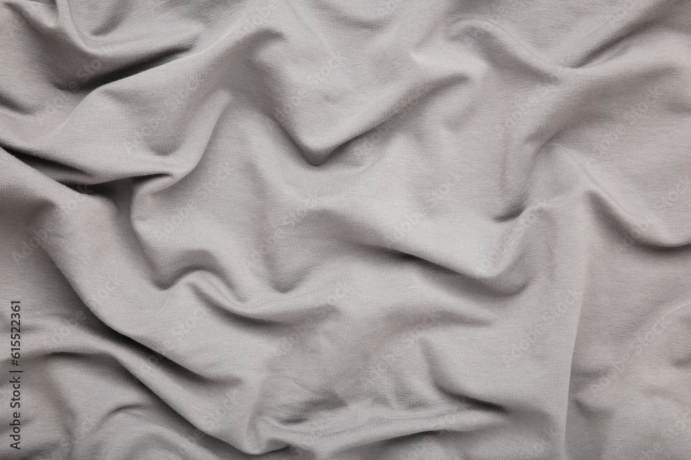 Crumpled grey fabric texture. Space for text Crumpled grey fabric texture. Space for text