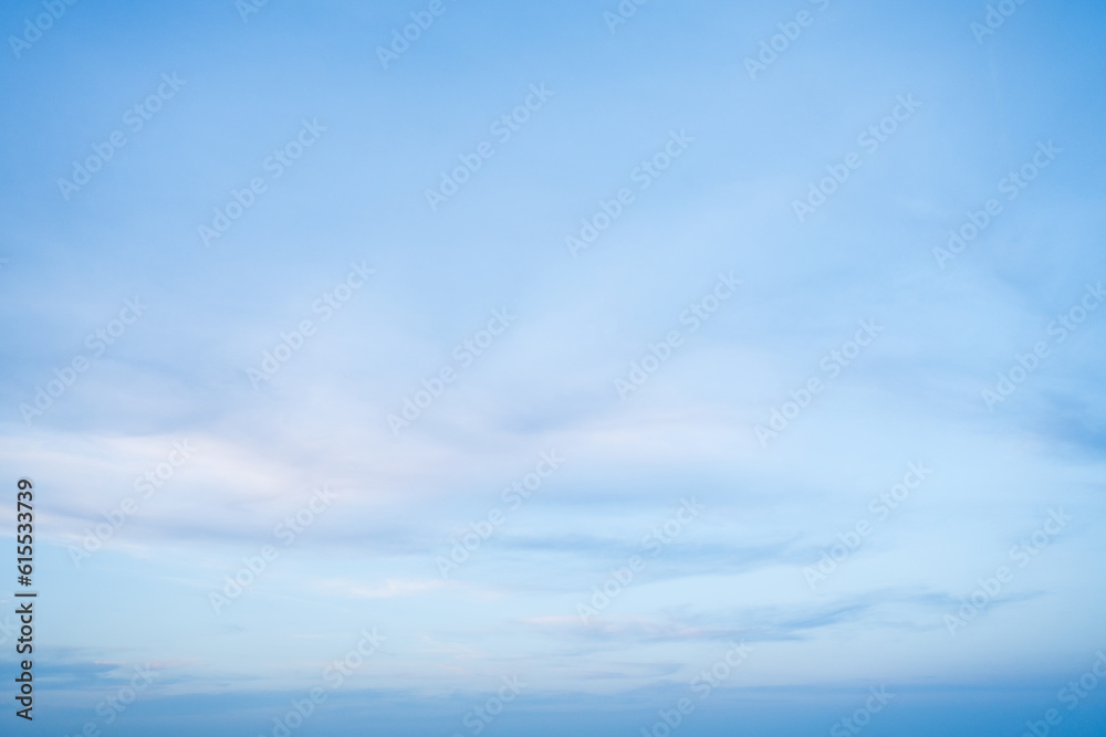Pastel Blue and Pink Sky with light fluffy clouds Pastel Blue and Pink Sky with light fluffy clouds
