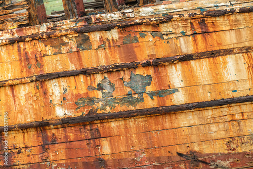 part of the bow of shipwreck with rust and peeled paint in the ship graveyard of Camaret-sur-Mer, Finisterre, Brittany, France photo