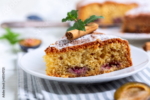 Slices of sponge cake with plums.
