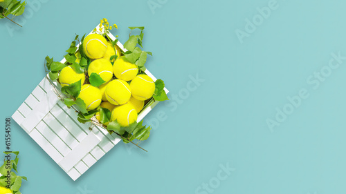 Tennis composition with tennis balls in white wooden boxes on blue background. Summer tennis competition. Concept of Healthy sport. Flat lay, copy space photo