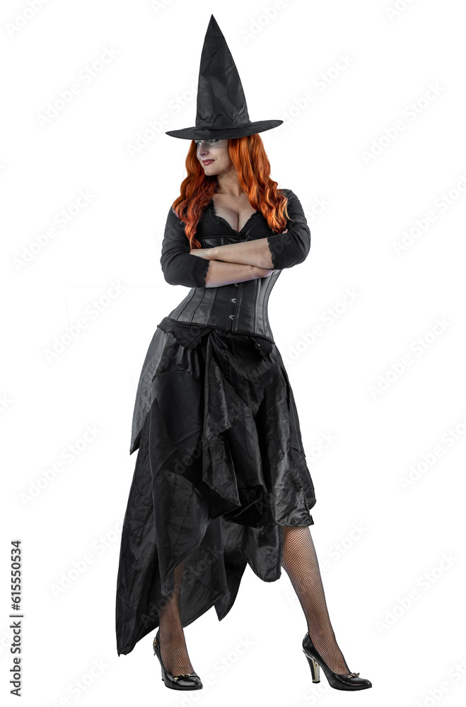 Witch on Halloween. Female wizard fairy character for All Saints' Day. Fantasy gothic red-haired Vampire girl in black dress. Enchantress dressed in carnival costume