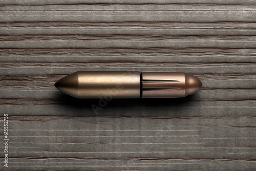 Bullets on wooden background