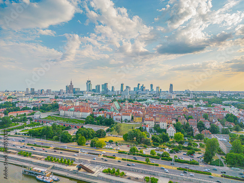 Aerial panorama of Warsaw, Poland over the Vistual river and City center in a distance Old town. Downtown skyscrapers cityscape. Business