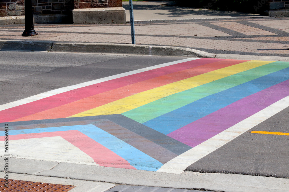 Obraz premium Pride Rainbow LGBT Sidewalk Crosswalk on city road