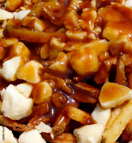 Canadian cuisine poutine french fries gravy and cheese curds close up