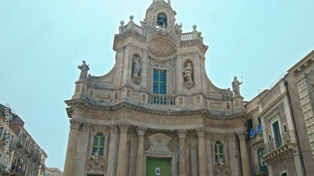 Close-up view of Basilica della Collegiata in Catania, Italy. Historical church featuring a baroque-style facade and a domed, vaulted ceiling with painted frescos in Sicily. Close-up view of Basilica della Collegiata in Catania, Italy. Historical church featuring a baroque-style facade and a domed, vaulted ceiling with painted frescos in Sicily.