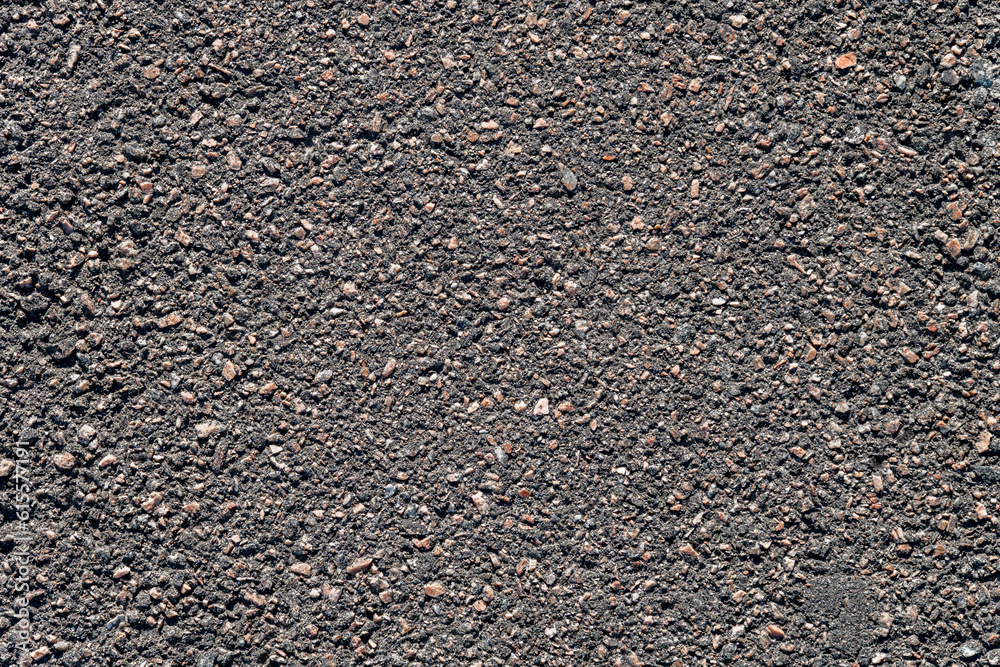 Top view of new asphalt road. Paved road background. Close-up texture. Top view of new asphalt road. Paved road background. Close-up texture.