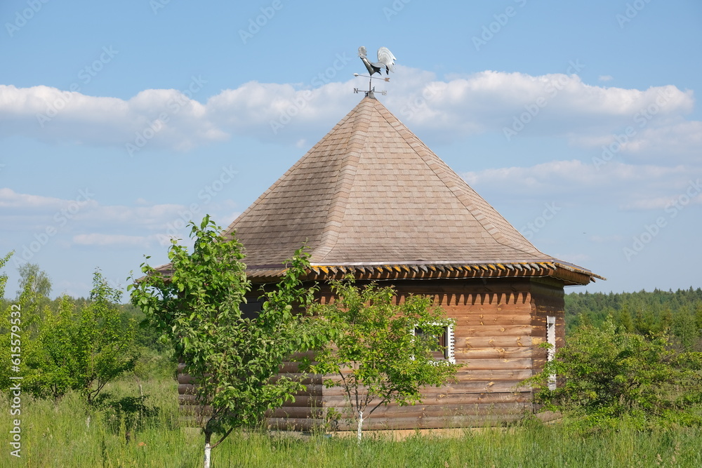 A wooden house was built in the field A wooden house was built in the field