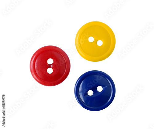 Принти на полотні Three red blue and yellow plastic sewing buttons isolated cutout on transparent