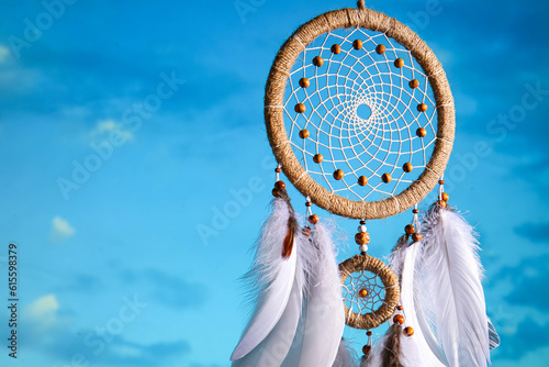 Canvas Print Beautiful dream catcher hanging against blue sky