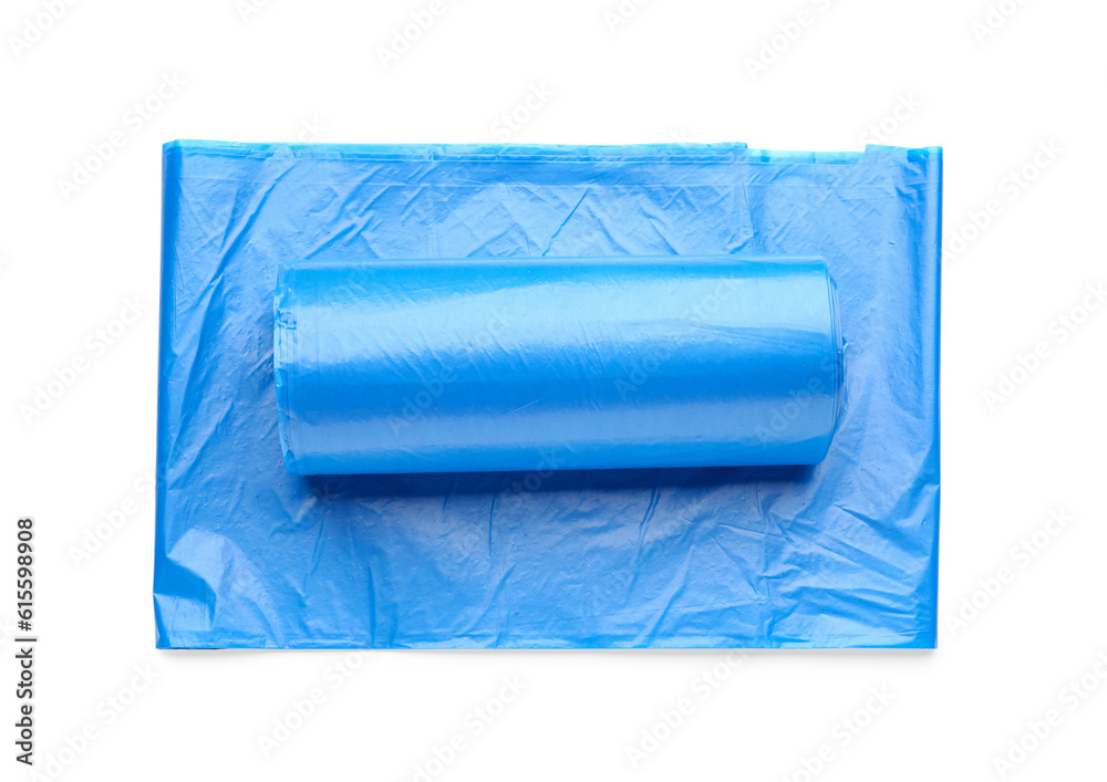 Obraz premium Blue roll of garbage bags isolated on white background