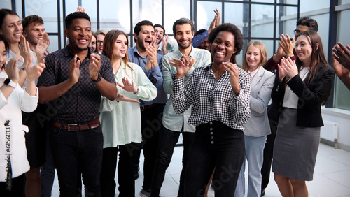 Business people clapping their hands after a seminar