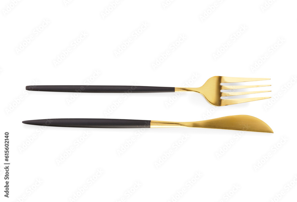 Golden fork and knife with black handles on white background Golden fork and knife with black handles on white background