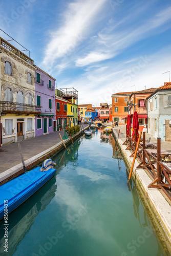 The canal with colorful houses on The Burano island near Venice, Italy, Europe.