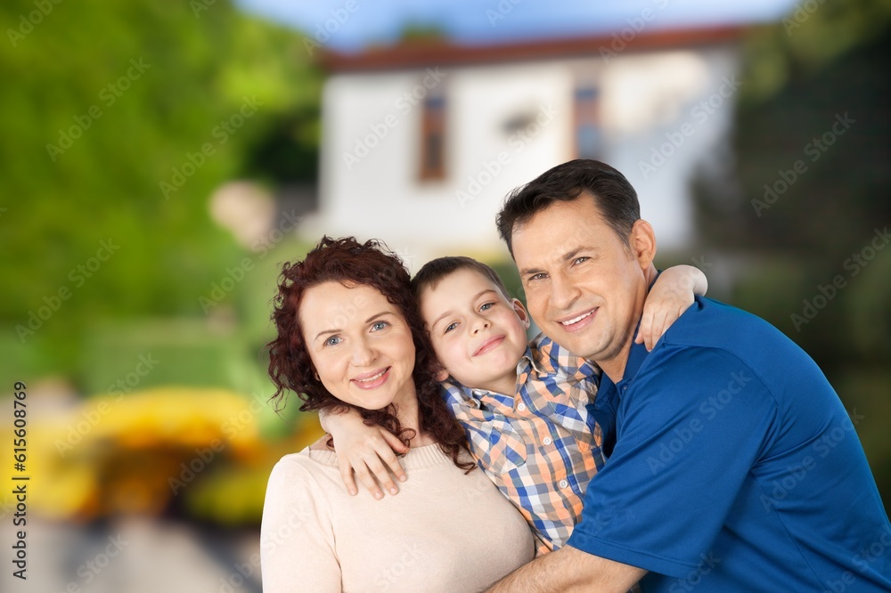 Fototapeta premium Happy young family near new house have fun
