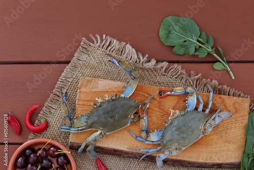 Mediterranean crabs on table, top view, dark background, free space, background image, for presentations photo