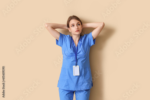 Tired female medical intern...