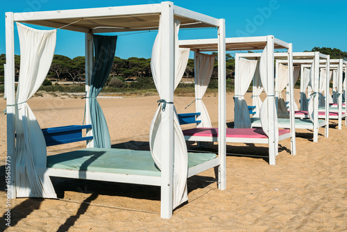 Luxurious sunloungers on the beach at Quarteira  Algarve  Portugal