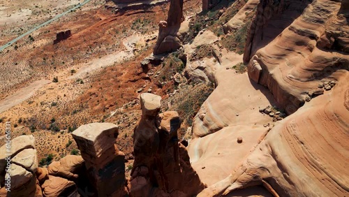 Cinematic aerial view over the sunny a red rock of mountain Zion National Park Utah US. Drone Flight Through a Wild Desert Landscape