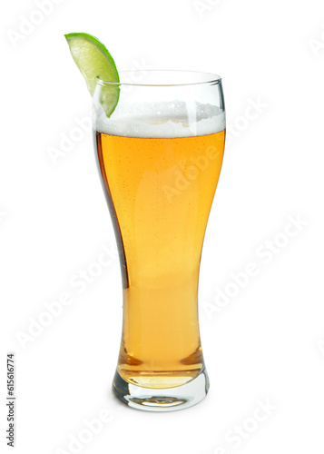 Glass of cold beer with lime on white background