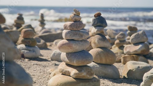 Close up of cairn at beach infront of ocean at cape point national park