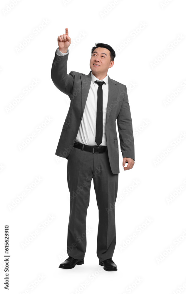Businessman in suit posing on white background Businessman in suit posing on white background