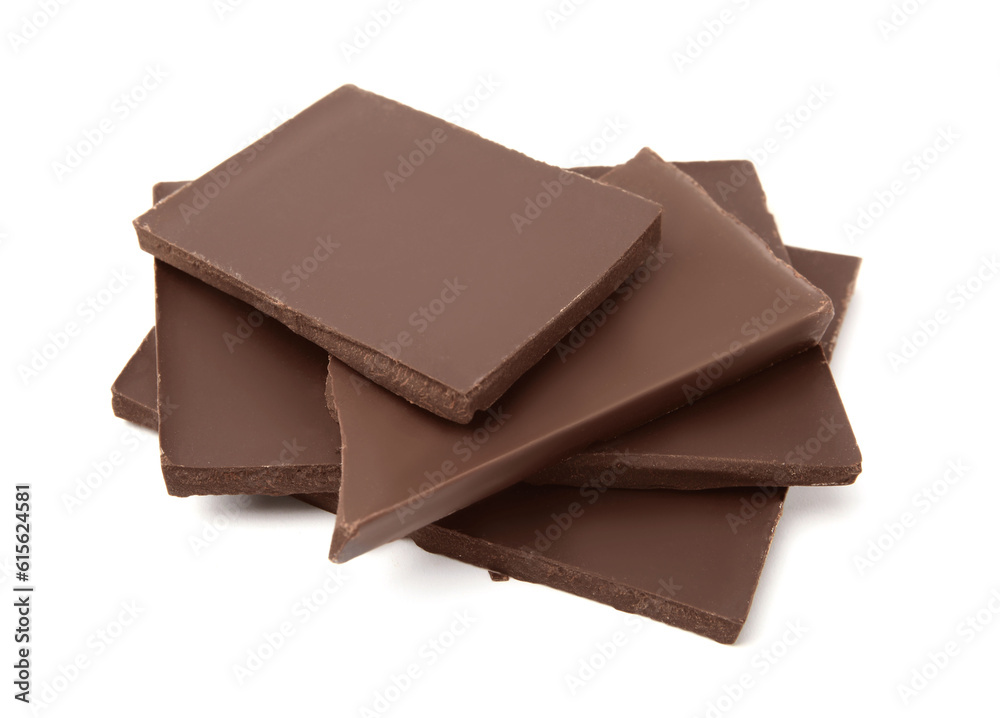 Fototapeta premium Pieces of tasty dark chocolate bar on isolated white