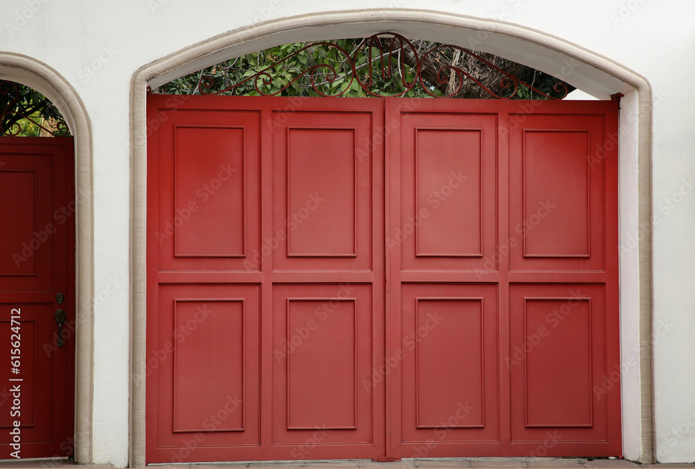 Exterior of building with beautiful wooden gates Exterior of building with beautiful wooden gates