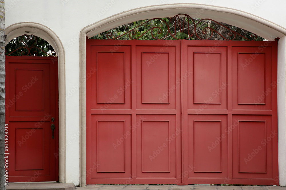 Exterior of building with beautiful wooden gates Exterior of building with beautiful wooden gates
