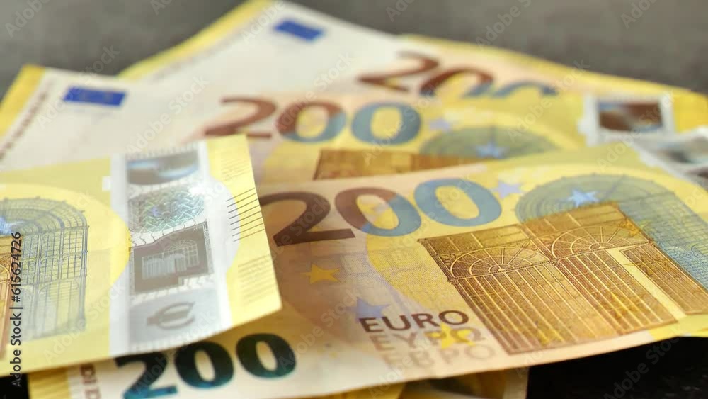 Two hundred euro banknotes pack on the table.Euro currency exchange rate. Counting euro banknotes. 4k footage Two hundred euro banknotes pack on the table.Euro currency exchange rate. Counting euro banknotes. 4k footage