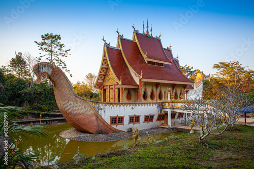 scenery The beautiful Suphannahong boat was builted in the pool at Sancomfu temple Chiang Rai Thailand.
decorate with gold. This unique style of architecture is often found in traditional Thai art and photo