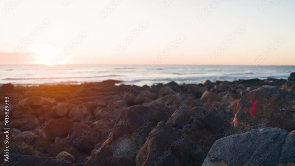 Dark rocks at the ocean at sunset in misty cliffs, cape town Dark rocks at the ocean at sunset in misty cliffs, cape town