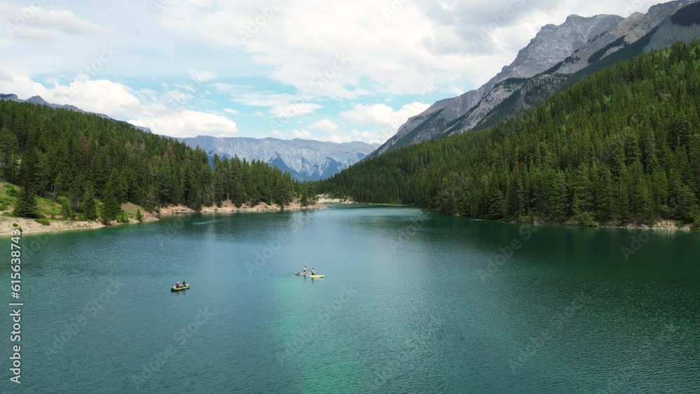 drone shot of lake two jack , people kayaking, beautiful water color and weather, Banff National park drone shot of lake two jack , people kayaking, beautiful water color and weather, Banff National park