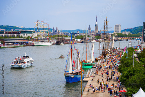 Rouen, France - June 17, 2023: Old sailing ships moored on the quays of the Seine in Rouen in Normandy for the Armada, a popular international gathering of historic schooners
