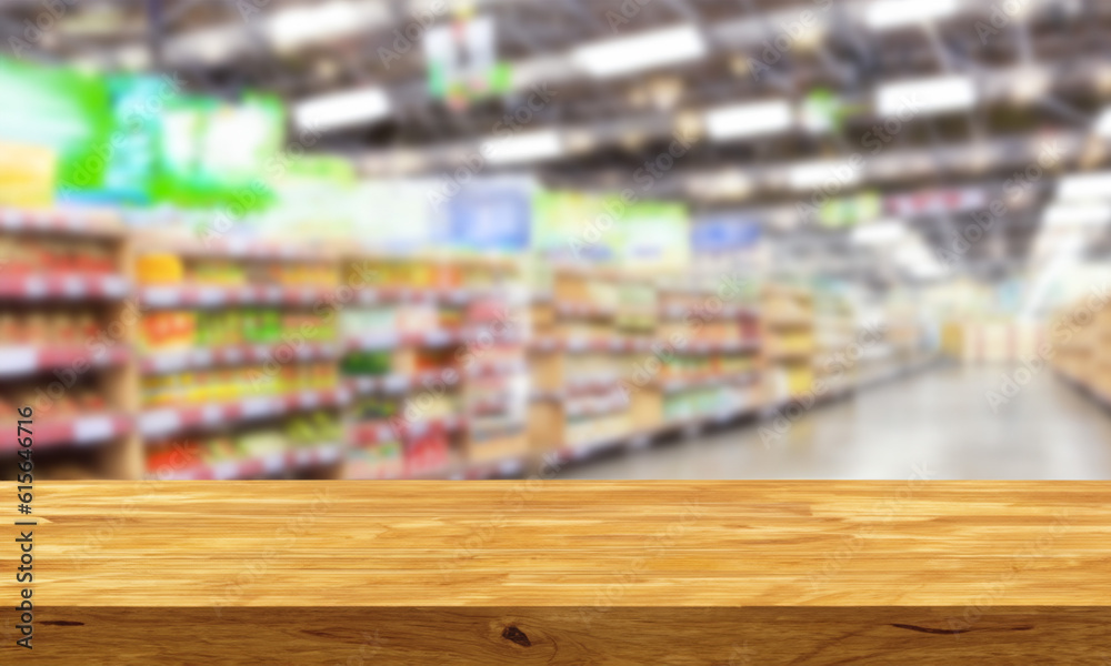 Wooden counter with blurred supermarket background. Table in the foreground for displaying products.