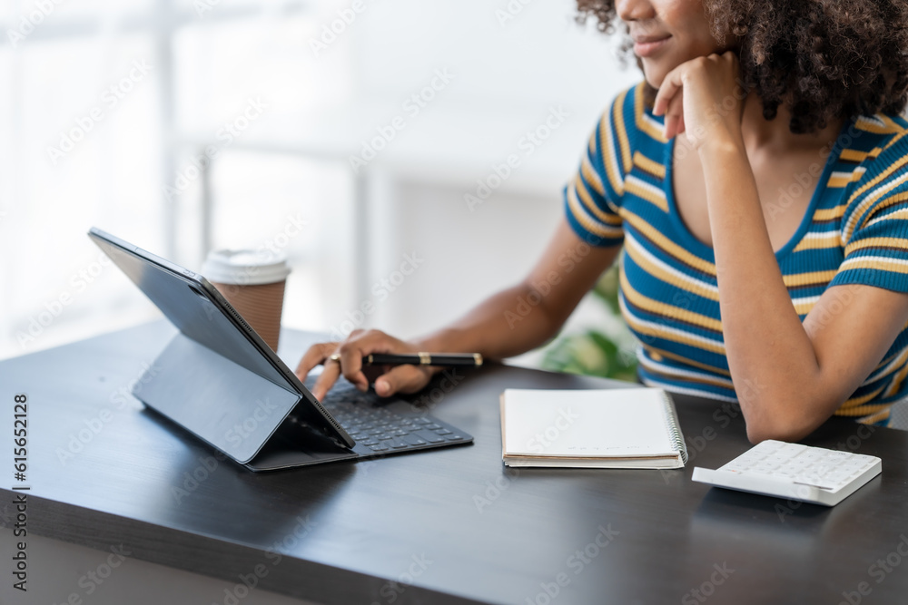 Fototapeta premium Young female african american student learning chinese language class online lecture via video conference, distance education