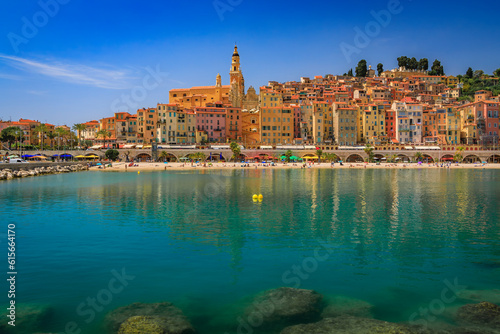 View of the colorful old town facades above the Mediterranean Sea in Menton on the French Riviera, South of France on a sunny day