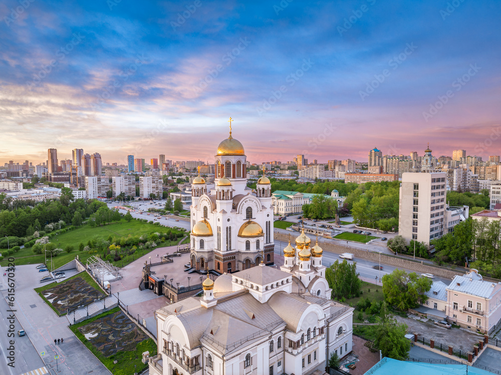 Obraz premium Summer Yekaterinburg, Temple on Blood and Church of St Nicholas in sunset. Aerial view of Yekaterinburg, Russia. Translation of text on the temple: Honest to the Lord is the death of His saints