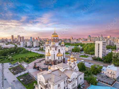 Summer Yekaterinburg, Temple on Blood and Church of St Nicholas in sunset. Aerial view of Yekaterinburg, Russia. Translation of text on the temple: Honest to the Lord is the death of His saints