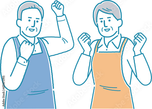 エプロン姿でポーズをとる老夫婦