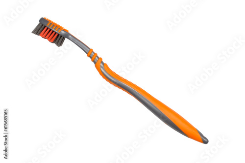 A modern toothbrush is isolated on a white background. New toothbrush close-up.