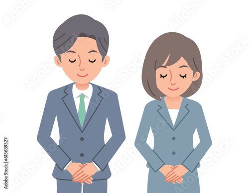 お辞儀をするビジネスパーソン男女
