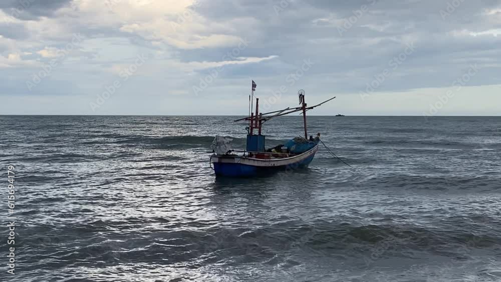 4k slow motion boat floating in the sea at twilight with cloudy overcast nobody. seascape scenic footage.