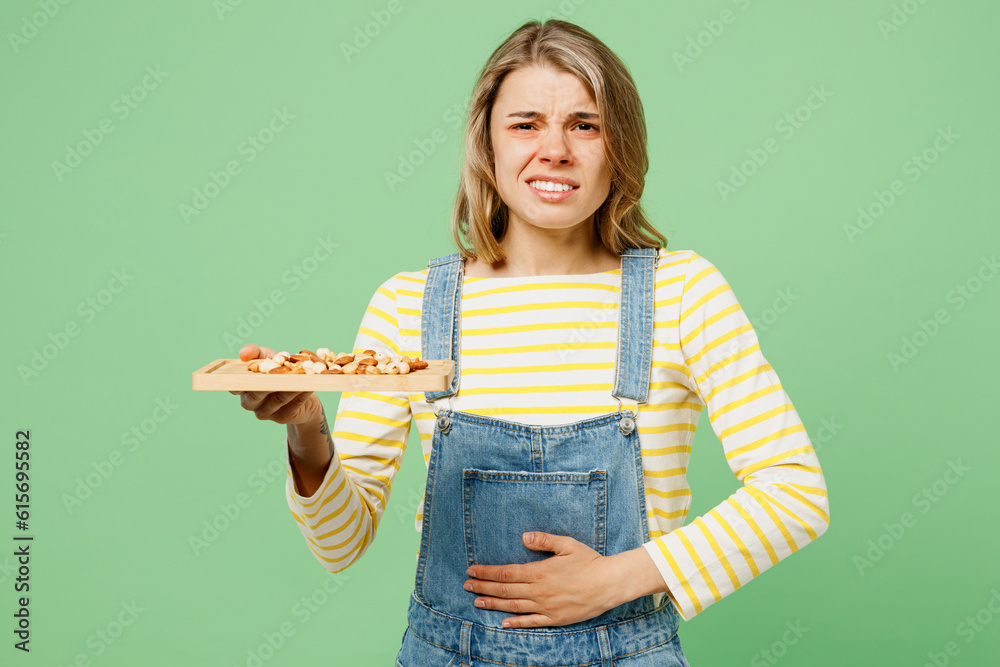 Sick unhealthy ill allergic woman has red watery eyes runny stuffy sore