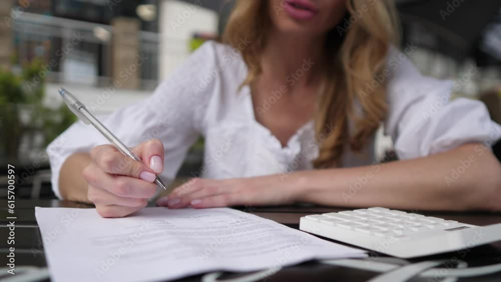 Woman working with documents in a summer cafe slow motion 4k Woman working with documents in a summer cafe slow motion 4k
