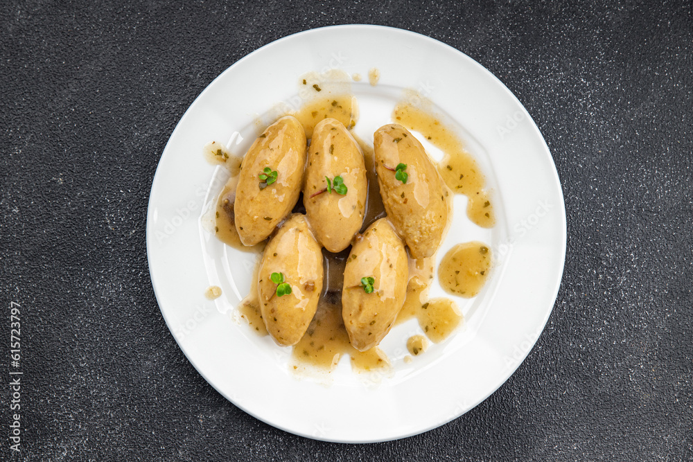 quenelles mushroom sauce meal food snack on the table copy space food background rustic top view